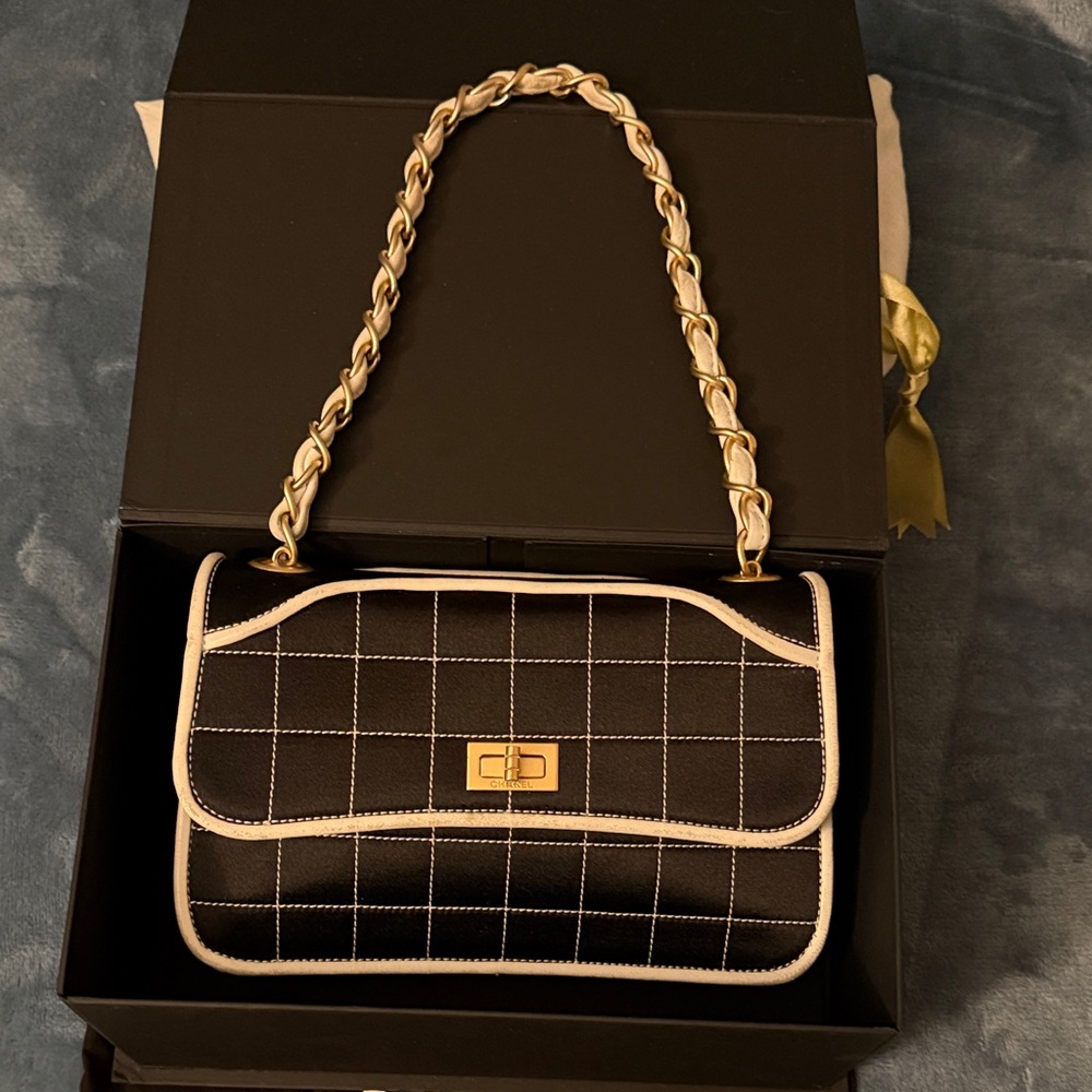 CHANEL Black and White Quilted Shoulder Bag with Gold Chain